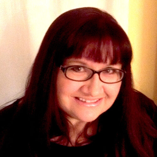 A portrait of the author Suzanne Kelman